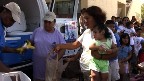 Immokalee families waiting in line for food